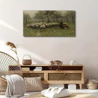 Tableau toile imprimée Des moutons paissent dans un paysage mystique