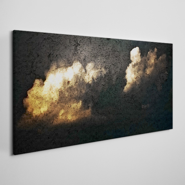 Tableau imprimé sur toile Nuages dorés sur fond sombre