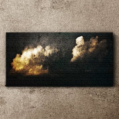 Tableau imprimé sur toile Nuages dorés sur fond sombre