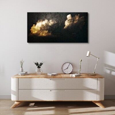 Tableau imprimé sur toile Nuages dorés sur fond sombre