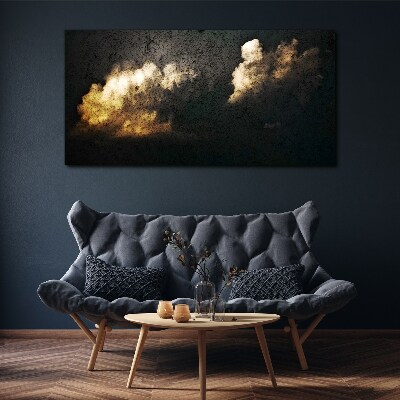 Tableau imprimé sur toile Nuages dorés sur fond sombre