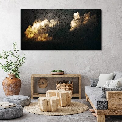 Tableau imprimé sur toile Nuages dorés sur fond sombre