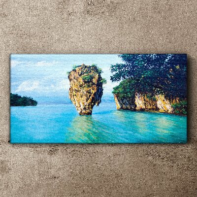 Tableau sur toile Une baie calme avec un haut rocher