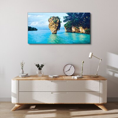 Tableau sur toile Une baie calme avec un haut rocher