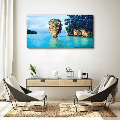 Tableau sur toile Une baie calme avec un haut rocher