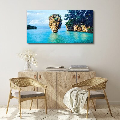 Tableau sur toile Une baie calme avec un haut rocher