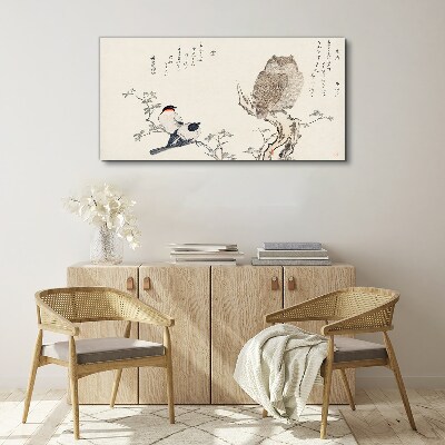 Tableau toile imprimée Des oiseaux et un hibou sur une branche