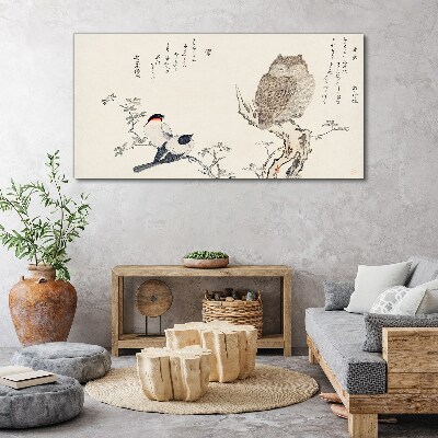 Tableau toile imprimée Des oiseaux et un hibou sur une branche
