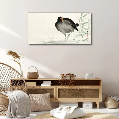Tableau sur toile Un oiseau sur l'herbe