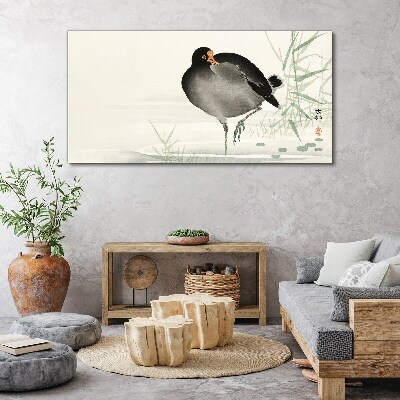 Tableau sur toile Un oiseau sur l'herbe