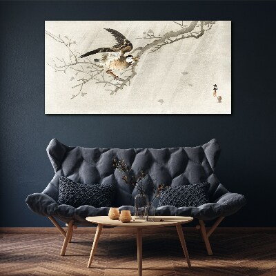Tableau imprimé sur toile Un oiseau sur une branche
