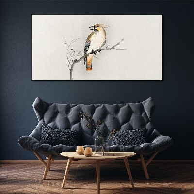 Tableau toile imprimée Un oiseau chanteur sur une branche