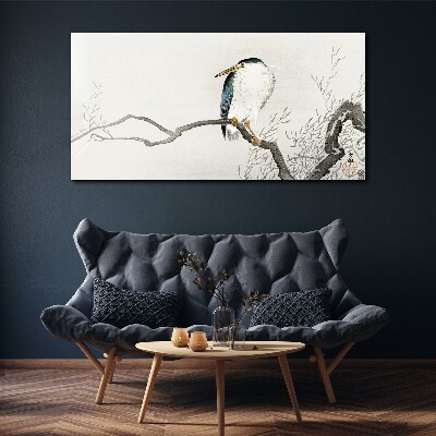 Tableau imprimé sur toile Un oiseau sur une branche dans un paysage délicat