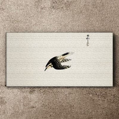 Tableau imprimé sur toile Le vol d'un oiseau en silence