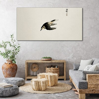 Tableau imprimé sur toile Le vol d'un oiseau en silence