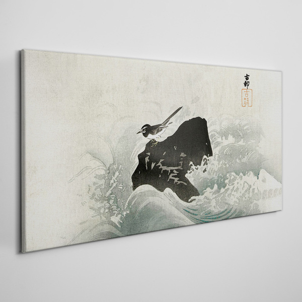 Tableau toile imprimée Un oiseau sur un rocher dans les vagues