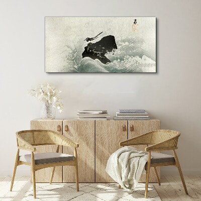 Tableau toile imprimée Un oiseau sur un rocher dans les vagues