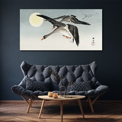 Tableau sur toile Oies en vol sous la pleine lune