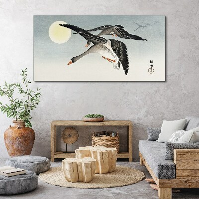 Tableau sur toile Oies en vol sous la pleine lune