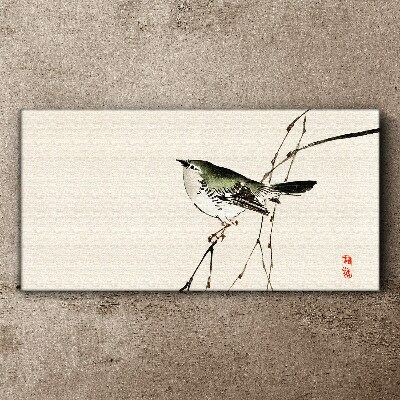 Tableau imprimé sur toile Un oiseau sur une branche
