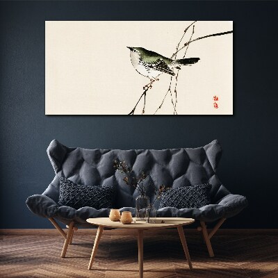 Tableau imprimé sur toile Un oiseau sur une branche
