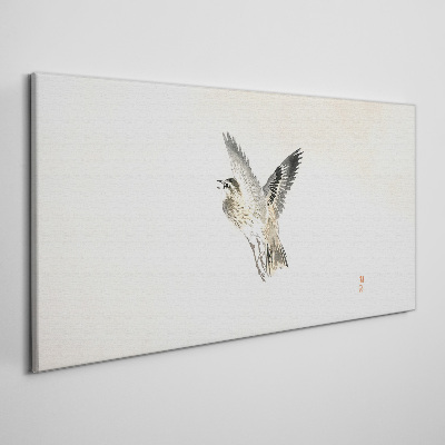 Tableau imprimé sur toile Vol d'oiseau aux couleurs délicates
