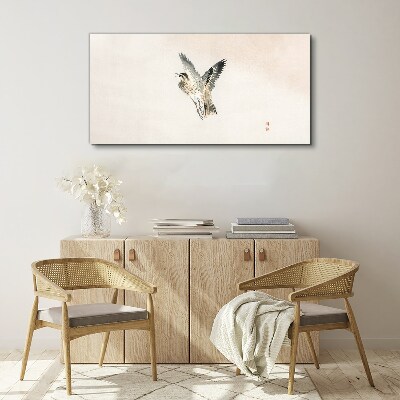Tableau imprimé sur toile Vol d'oiseau aux couleurs délicates