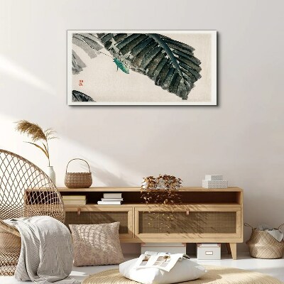Tableau imprimé sur toile Un insecte mince sur les feuilles