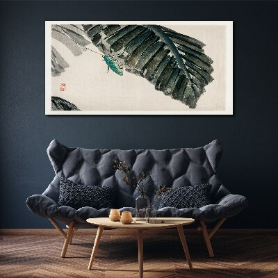 Tableau imprimé sur toile Un insecte mince sur les feuilles