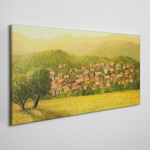 Tableau sur toile Un village ensoleillé au milieu des collines