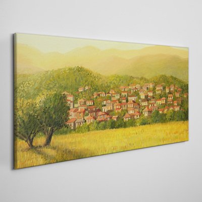 Tableau sur toile Un village ensoleillé au milieu des collines