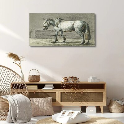 Tableau imprimé sur toile Un cheval qui marche dans des tons de gris