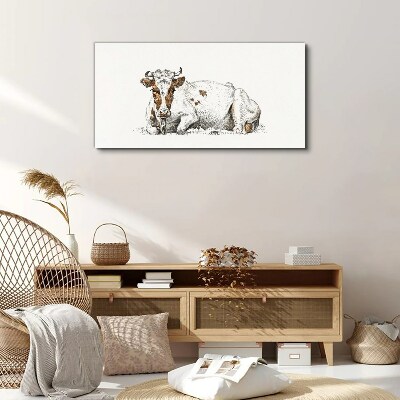 Tableau toile imprimée Une vache calme dans le pré