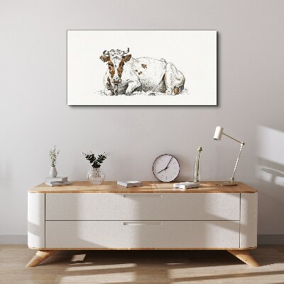 Tableau toile imprimée Une vache calme dans le pré