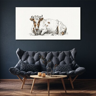 Tableau toile imprimée Une vache calme dans le pré