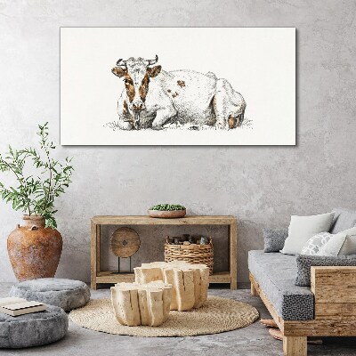 Tableau toile imprimée Une vache calme dans le pré