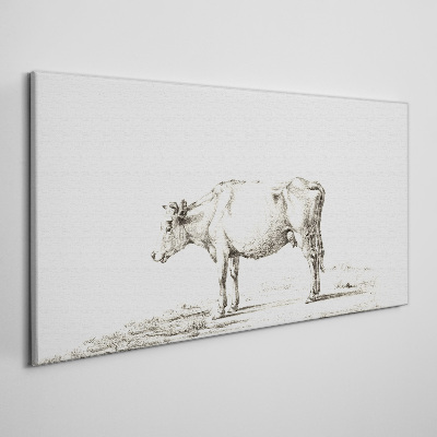 Tableau toile imprimée Une vache calme sur fond de nature