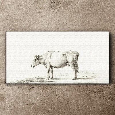 Tableau toile imprimée Une vache calme sur fond de nature