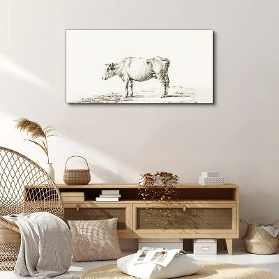 Tableau toile imprimée Une vache calme sur fond de nature