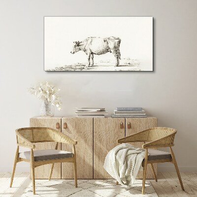 Tableau toile imprimée Une vache calme sur fond de nature