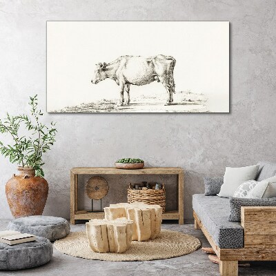Tableau toile imprimée Une vache calme sur fond de nature