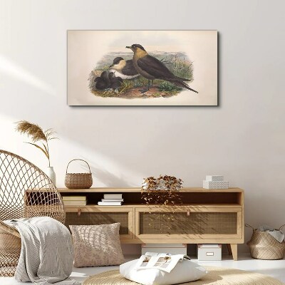 Tableau imprimé sur toile Une famille d'oiseaux sur un nid