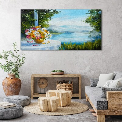 Tableau sur toile Un bouquet de fleurs au bord du lac