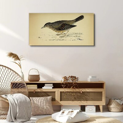 Tableau imprimé sur toile Un oiseau sur fond beige