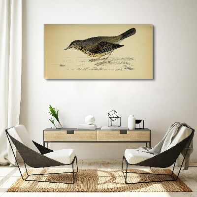 Tableau imprimé sur toile Un oiseau sur fond beige