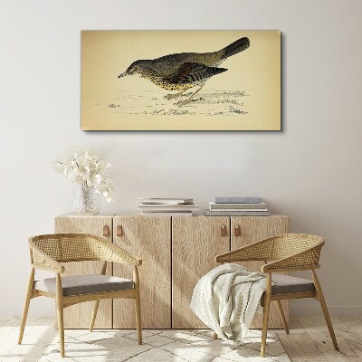 Tableau imprimé sur toile Un oiseau sur fond beige