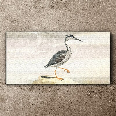 Tableau sur toile Un oiseau migrateur sur fond de nature