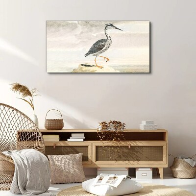 Tableau sur toile Un oiseau migrateur sur fond de nature