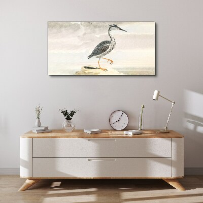 Tableau sur toile Un oiseau migrateur sur fond de nature