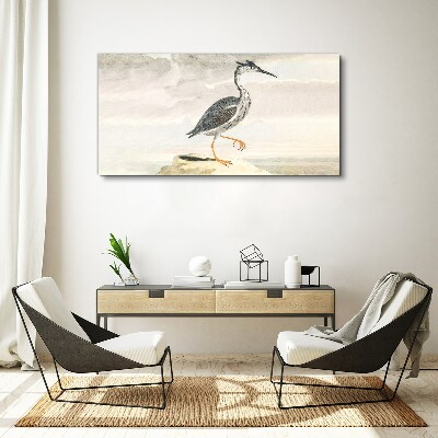 Tableau sur toile Un oiseau migrateur sur fond de nature